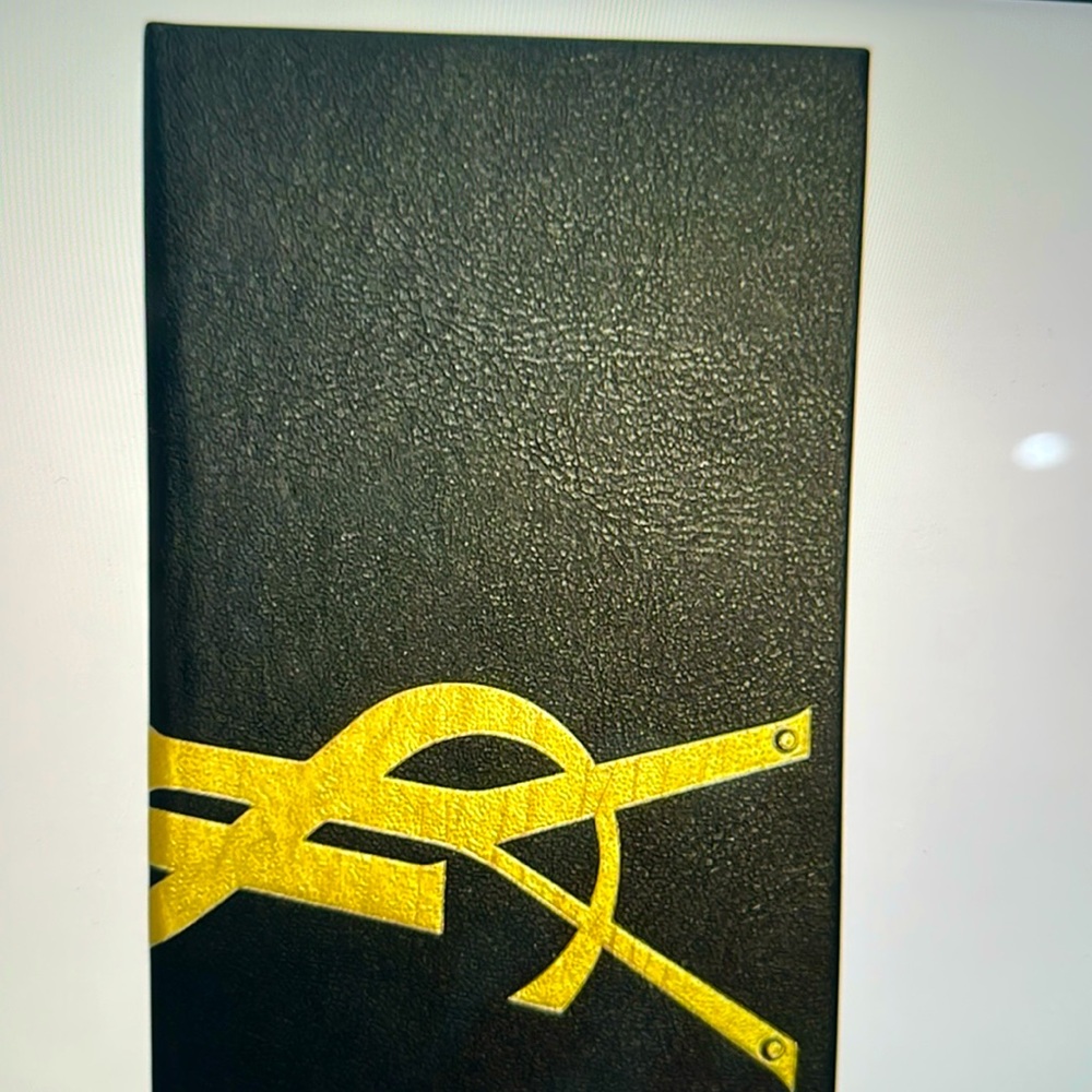 Yves Saint Laurent Black and Gold Notebook